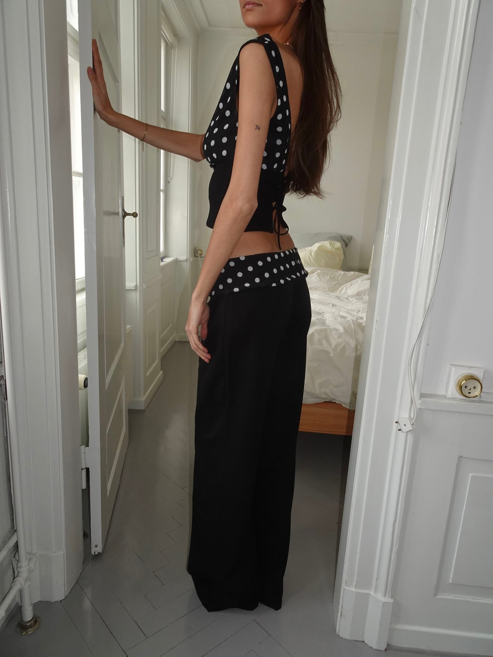 Calça Calsia com acabamento de bolinhas - Preto